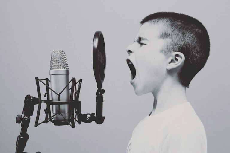 Child screaming in a studio microphone