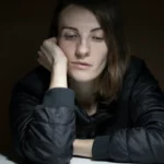 Person man woman gazing into the void