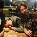 Man passed out from drinking with friends