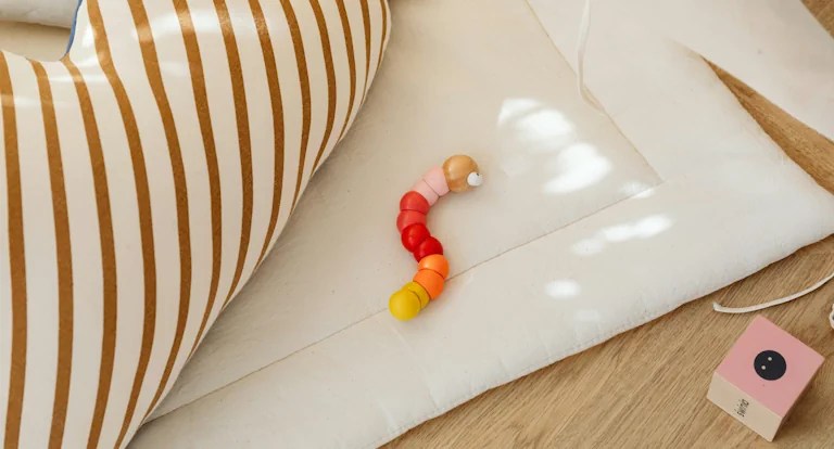 Toy worm on the floor